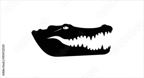 Black silhouette of crocodile head.