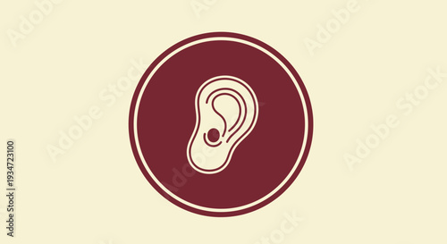 Hearing Symbol Within A Maroon Circle Demonstrating Auditory Sensation and Sound Perception