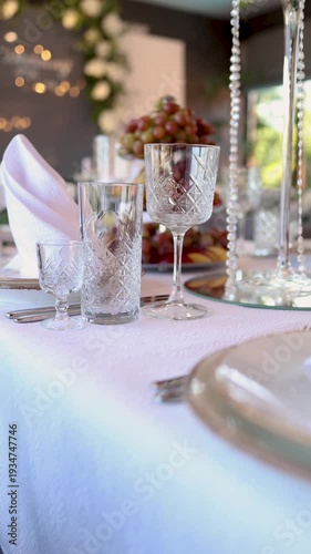 Elegant wedding table setting with crystal glasses