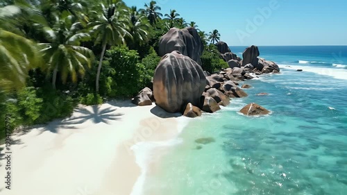 Wallpaper Mural Idyllic tropical beach with granite boulders, palm trees, and turquoise waters Torontodigital.ca