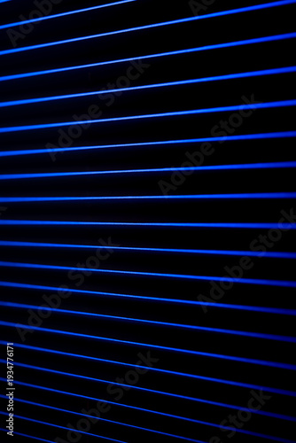 Blue neon lines with deep perspective. Neon corridor.