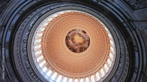 The mesmerizing dome inside of US Capitol in Washington, DC. Capitol's cast-iron dome is among the oldest such structures in the world