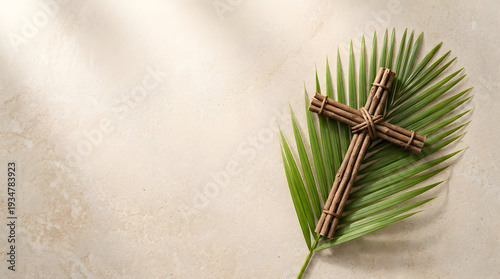 Rustic wooden cross tied on palm branch for Palm Sunday Promotion holy week theme