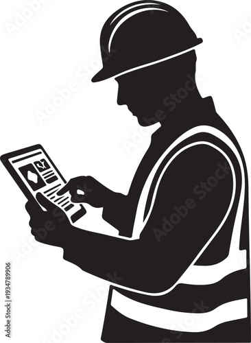 Construction worker in safety vest and hard hat using digital tablet device