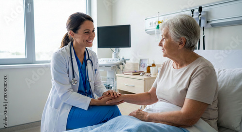 Portrait of a smiling female doctor holding the hand of an elderly woman lying in a hospital bed, expressing compassion and support during a medical visit