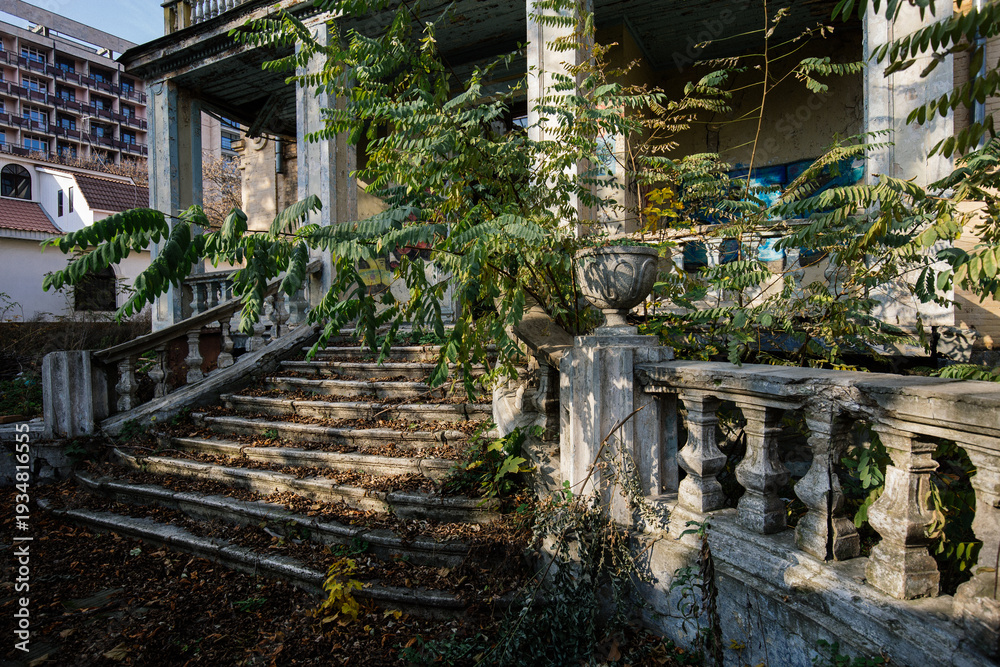 Fototapeta premium Old ruined abandoned overgrown mansion