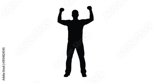 A victorious man raises both arms in celebration silhouette