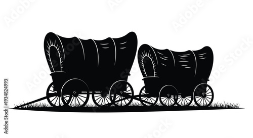 Two covered wagons travel across grass a striking silhouette