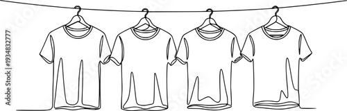 Continuous line drawing of four tshirts hanging on clothes hangers from a clothesline
