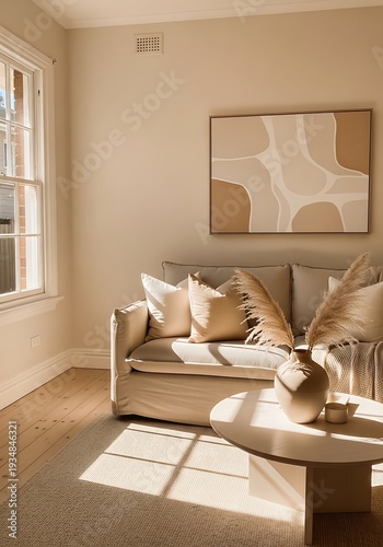 Sunlit living room interior with contemporary decor and neutral color palette