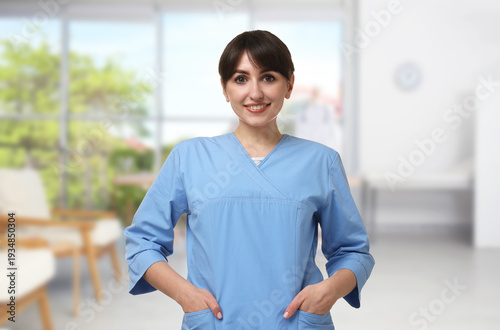 Young nurse in uniform at clinic office Free Download Young nurse in uniform at clinic office - GFXLoad