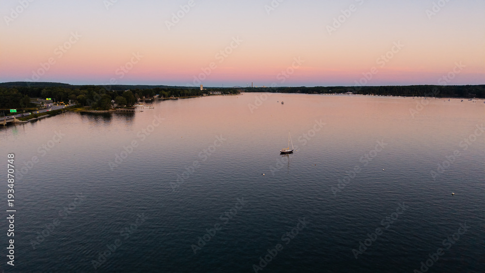 Fototapeta premium Sunset aerial View of the Great Bay at the Scammell Bridge in New Hampshire