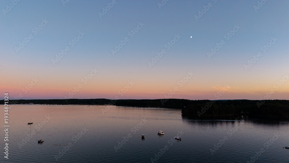 Obraz premium Sunset aerial View of the Great Bay at the Scammell Bridge in New Hampshire