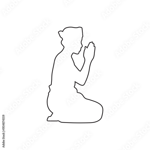 Person kneeling in prayer
