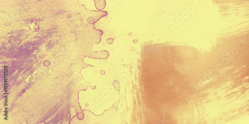 Yellow and purple watercolor paint splatters and brush strokes