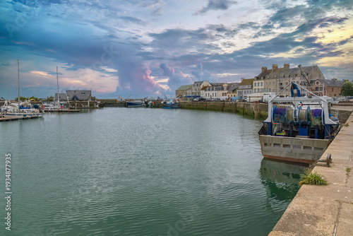 Barfleur in Normandy, the harbor, with traditional houses in background
