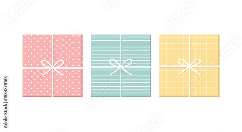 Illustration of three pastel-colored gift boxes with bows stacked vertically