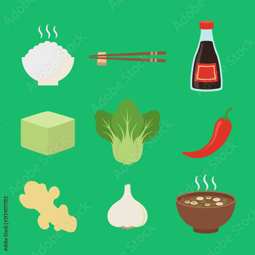 Selection of ingredients for Asian cuisine featuring bowl of rice, chopsticks, soy sauce, tofu, bok choy, chili pepper, ginger, garlic and miso soup bowl