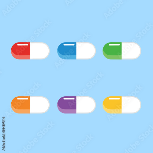 Set of colorful medical capsules and antibiotic pills in red blue green orange purple and yellow colors isolated on blue background for healthcare and pharmacy