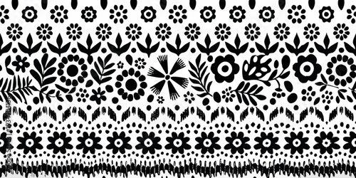 Black and white floral pattern with stylized botanical elements