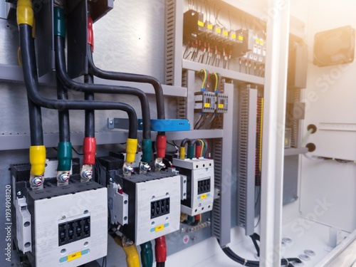 Fotografie Technology electrical control for Installation the three phase main contactors t