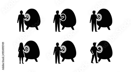 People interacting with a large egg-shaped object with a target symbol.