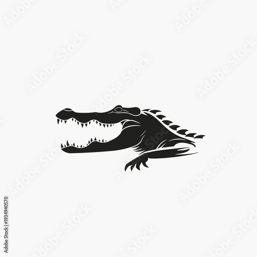 Black silhouette of a crocodile isolated on white background for design assets