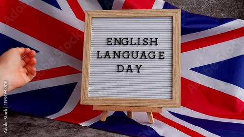 Message ENGLISH LANGUAGE DAY on background of Great Britain UK flag. British national flag with concept of High school university college education, language courses, online distance learning