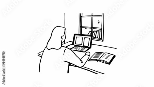 Woman sits at a table focusing on a laptop screen near a window.