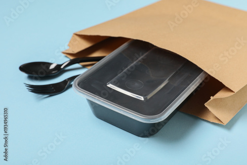 Paper bag with food contain...
