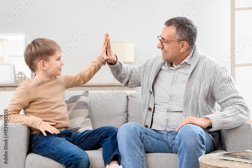 Elderly man and his little ...