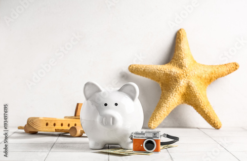 Piggy bank with money, came...