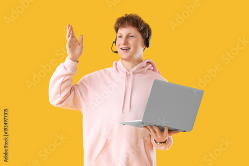 Young man in headset with l...