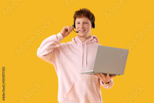 Young man in headset with l...