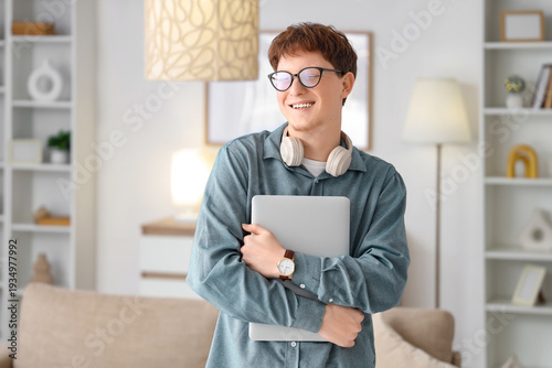 Young man in eyeglasses wit...