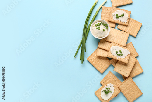 Tasty crackers with bowl of...