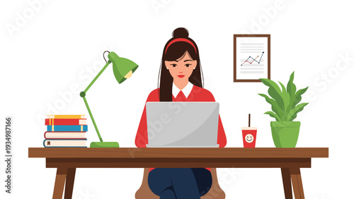 Young woman focused on her work while sitting at a wooden desk with a laptop, green lamp, books, and a plant in a bright home office setting.