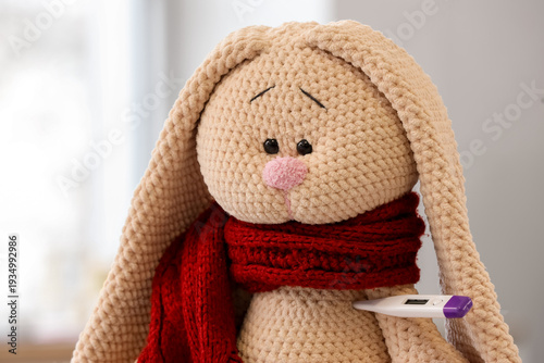 Ill bunny toy with thermome...