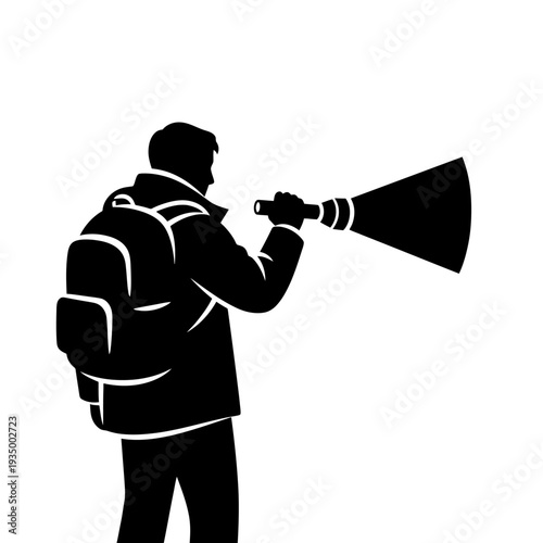 Man with backpack using torch to clear darkness 