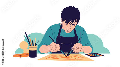 Young male artist focused on painting with two brushes simultaneously on a canvas in an art studio with paints and tools.