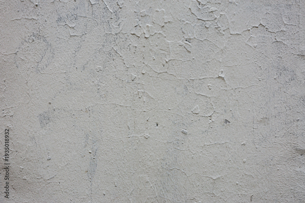 Fototapeta premium Abstract background of old damaged grey wall.
