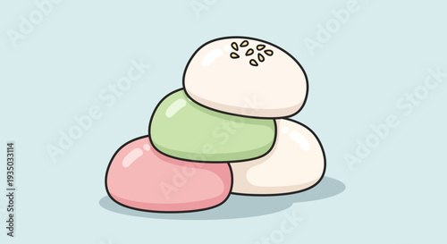 Stack of colorful mochi desserts on a light blue background