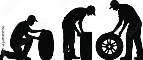 Black silhouette of professional auto mechanics working with car tires and wheels isolated on white background for automotive service industry