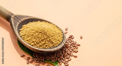 Close-up of a wooden spoon filled with ground flaxseed and whole flax seeds.