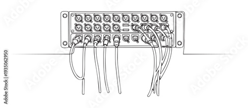 Professional audio patch panel unit displaying numerous XLR connectors with cables plugged in, essential for sound engineering, music production, live events, or recording studio setups.