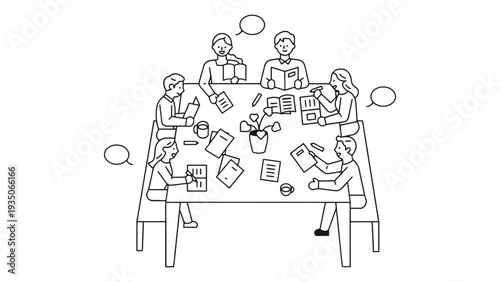 People sitting around a large wooden meeting table discussing ideas