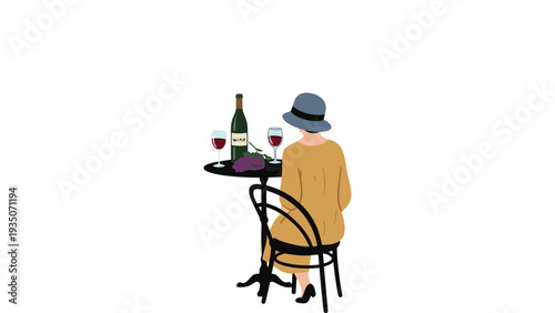 A person sits at a table with wine and grapes, enjoying a moment of leisure.