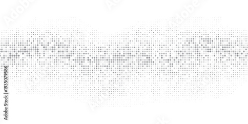 Abstract halftone background made of dots of different sizes in gray colors