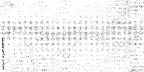 Abstract halftone background made of dots of different sizes in gray colors