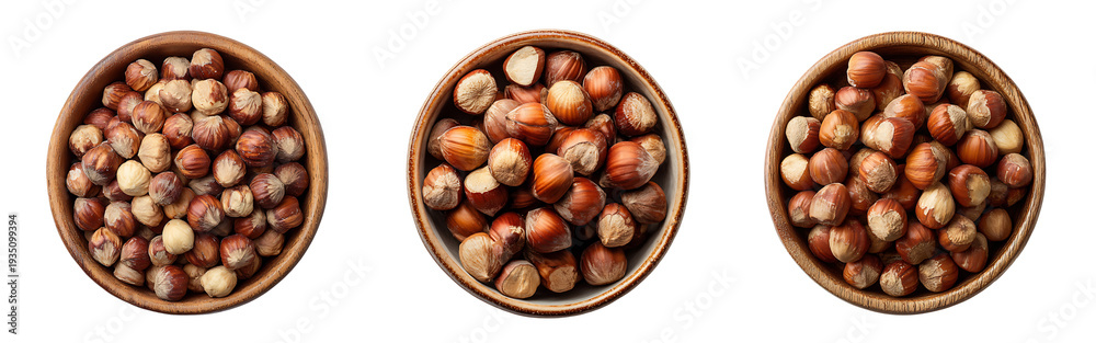 Obraz premium Three wooden bowls filled with hazelnuts isolated on a white or transparent background